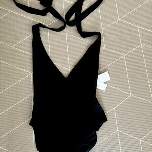 Brand new londre multiway black bathing suit size small. Tags still on.